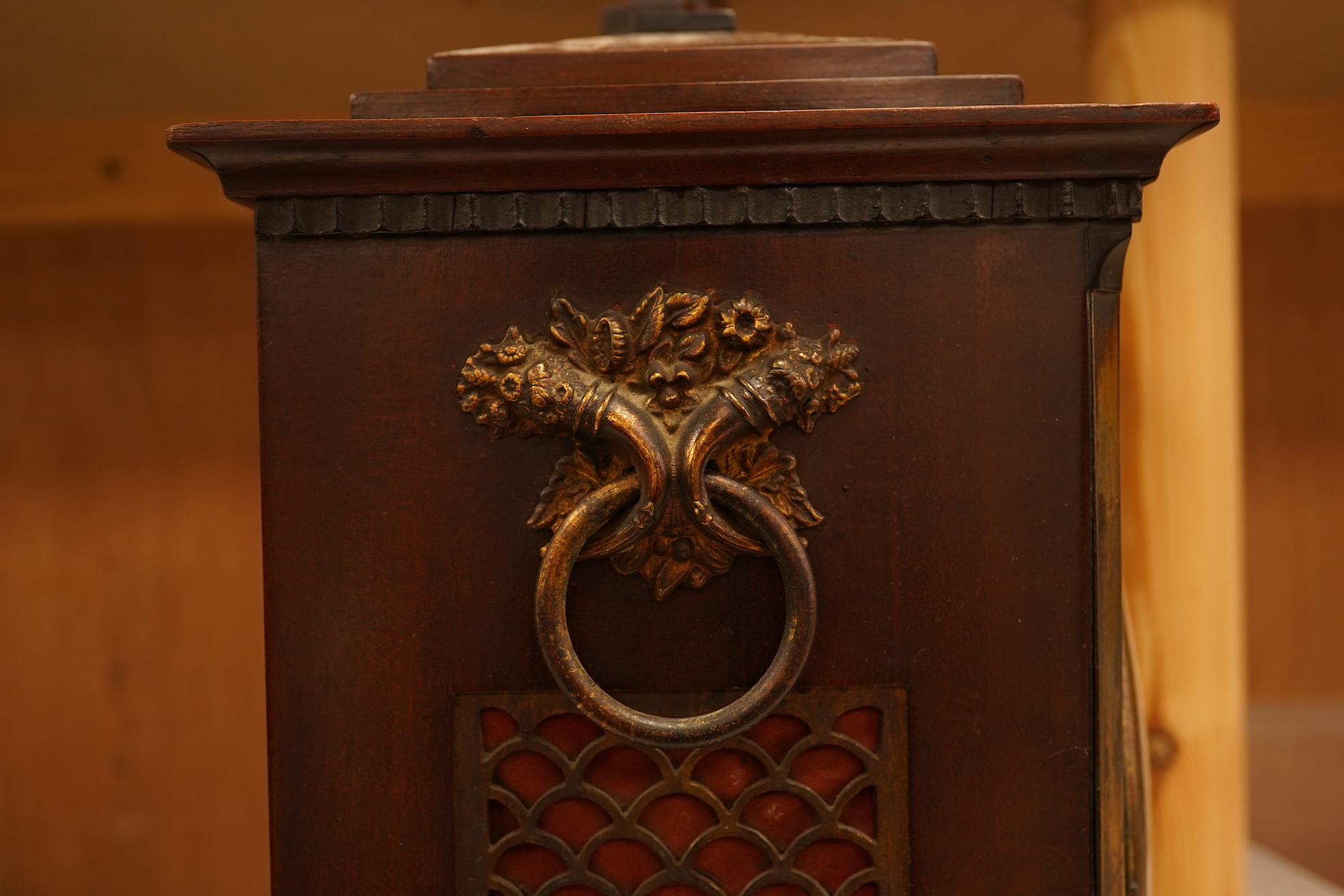 An early 19th century rosewood and brass bracket clock, striking on a bell, with pendulum and key, 47cm high
